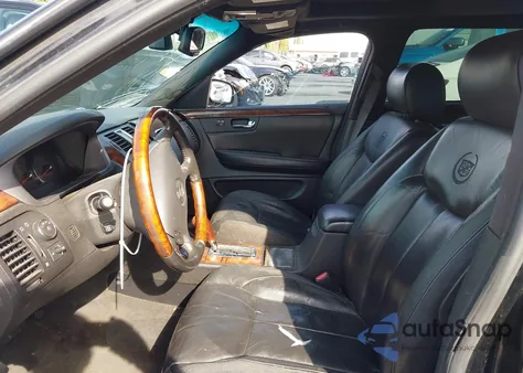 2006 Cadillac Dts Performance z USA, uszkodzony, nr VIN 1G6KD57916U113264